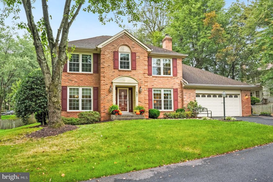 Classic brick front colonial loaded with upgrades in Westridge!   The gorgeous entry door (2021)  distinguishes this home from the start!   Off of the foyer is a spacious living room with hardwood floors and two sets of French doors that provide privacy and quiet when needed.  (The current owners have used this room as an office.)  This room leads to the formal dining room with hardwood floors and a wide, walk-in bay window that overlooks the back yard.  Please note the crown molding and chair rail.   The remodeled, gourmet kitchen features quality cabinetry with 42" upper cabinets and customized features (pull out drawers, utensil/flatware drawer, etc), granite counters and tiled backsplash.  The island serves as another work space and the perfect buffet!  Stainless appliances (2021)and ceramic tiled floors.  Casual dining is steps away and adjacent to the family room  - both with hardwood flooring!  A wood burning fireplace with colonial surround and built-in book cases will make this one of your favorite spaces!  Conveniently located steps from the garage and back door, is a half bath and a bright laundry/mud room, with a sink.  The washer and dryer new in 2021.
Hardwood floors grace the upper level hallway.  On this level is a private primary suite with a customized walk in closet and luxurious primary bath.  The remodeled bath includes a frameless shower, separate tub and double sinks, all perfectly accented with customized tile floor and tub and shower surround!  Three additional roomy bedrooms are on this level.   A  cheery, skylit hall bath is light and bright,  with customized tiling and wainscotting!
On the finished lower level is a spacious rec room, which includes a customized, stone front bar, complete with sink and refrigerator!  A private office, known as the "green room", is perfect for the streamer or graphic artist, with the green screen backdrop.  There is also a den and a full bath on this level.
Off of the kitchen eating area there is a fabulous screened porch!   Don't miss the tv, which is above the sliding door and conveys.  In '24, the porch was rescreened  with Nano 50 Poly Screening and the two screened doors were installed!  Exiting from the porch on the right, is a trex deck and stairs leading to the fenced back yard and the walkway around the garage side of the house.  Exiting on the other side, stairs lead to the stamped concrete patio (2021).  The retaining wall with stairs and the refurbished fire pit were also done then.  What a great back yard!!
NEW WATER HEATER 10/25!!
GAS LINE IS ON THE PIPESTEM for those who might want to connect!
Check out the garage - there is an extra niche for storage/a workshop/bikes/mower, etc!
Great location, near the Westridge pool and recreation center.  The elementary school is a few blocks away.