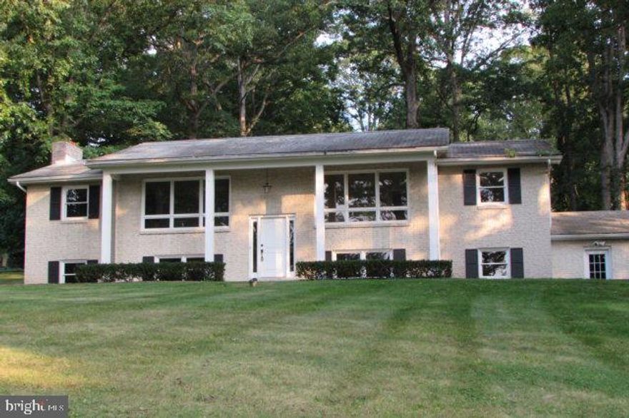 Complete interior renovation to this beautiful split entry home on corner lot in South Hills. Features 7 bedrooms and 3 full baths. Gorgeous kitchen with custom Cherry cabinets, granite counters, ceramic floor, and new top Consumer Reports rated stainless steel appliances. Refinished hardwood floors thru-out first floor, new carpets in lower level;large front facing windows with beautiful views. Unique fireplace in living/dining area, and family rm in lower walk-out level. Private outdoor entertaining spaces on deck, patio,& screened porch.