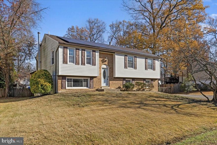 Beautiful and move-in ready! You will love this 4 bedroom 3 full bathroom spacious split foyer centrally located in Waldorf! New paint and carpet throughout! 1 year old furnace, 3 year old kitchen appliances! HUGE backyard! As you walk into the light filled main level, you will love the hard wood floors. The formal living and dining rooms are made for entertaining with an open floor plan. The dining room leads to the massive deck and rear yard, perfect for outdoor fun. Inside, the kitchen has stainless steel appliances, prep island, and room for table space. The primary bedroom has a private full bathroom that has been newly remodeled. Two additional bedrooms and an updated hall full bathroom complete this level. The lower level is just as impressive with a massive recreation room with wood burning fireplace, another full bathroom, the fourth bedroom with sitting room or office and laundry room. Minutes from all commuter routes, restaurants,  and shopping.  A must see!