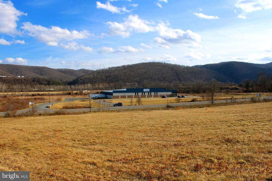 Ideally located near Cresaptown, Maryland, this 7.92-acre property presents a unique opportunity for commercial or industrial development. With excellent visibility and approximately 8,000 vehicles passing by daily (*traffic data available in the documents tab), the site offers prime exposure for potential businesses. Strategically positioned near Cumberland, MD, the I-68 corridor, and close to Keyser and Ft. Ashby, WV, the property provides easy access to major routes, making it ideal for seamless operations.
Whether you’re an owner-occupant looking to launch a new business or an investor seeking a profitable redevelopment, this property offers a distinct advantage. Its proximity to prominent employers like Allegheny Ballistics Lab, American Woodmark, IBM, and Northrop Grumman creates opportunities for potential synergies. Don’t miss the chance to secure this highly visible, well-connected site with unlimited potential.