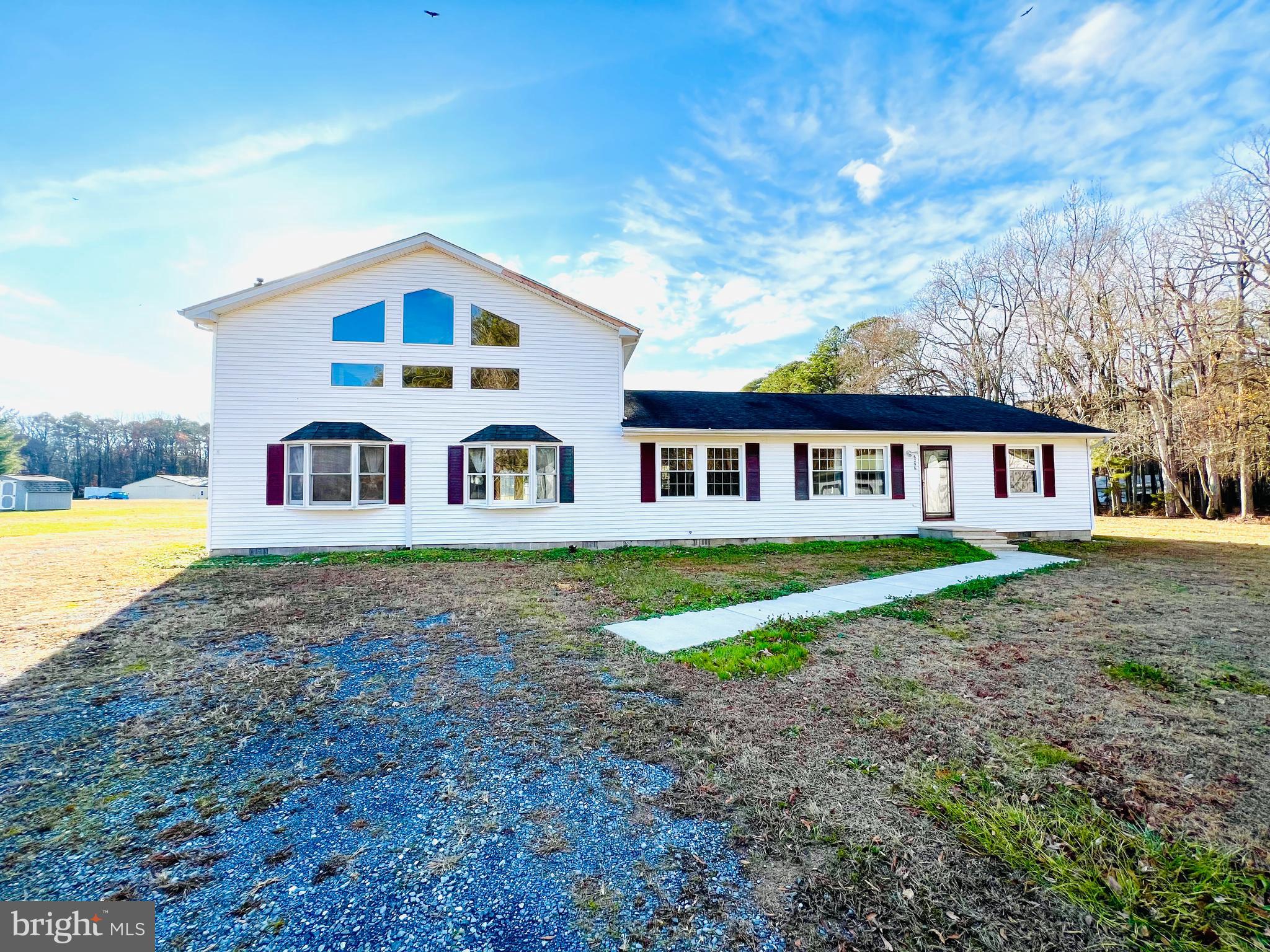 To no fault of its own this amazing home is back on the market in Talbot County set on 1 acre of land close to downtown Easton. Downstairs you will find 3 bedrooms, two full bathrooms, two utility areas, two potential living room/ dining room spaces, its a must see! The beautiful loft area could make this a 4 bedroom home, with two closets and a full bathroom with bath tub. A detached 2 car garage that could be a potential work shop adds a lot of character to this charming home. Being sold as is. Come take a look and see if this could be the home for you!