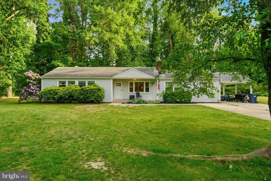 Location, location, location! Welcome home to this beautifully renovated rambler in the centrally located Town Creek community. Tucked away at the end of a quiet street and surrounded by mature trees, this home offers the perfect blend of privacy and convenience. The house has no deferred maintenance- the homeowners have done the work for you! Inside, you’ll find 3 bedrooms and 2 full baths, plus a versatile fourth room that currently serves as a bedroom but could be a home office, craft room, or flex space to suit your needs. The thoughtful layout includes two separate living areas—a bright, open living room connected to the kitchen, dining area, sunroom and a cozy den ideal for relaxing or entertaining. The updated kitchen shines with crisp white cabinetry and a center island with quartz countertops, making it perfect for gatherings and everyday living. The established Town Creek community is just minutes from shopping centers, NAS Patuxent River, and the Thomas Johnson Bridge, offering an easy commute and access to local amenities. Residents also enjoy access to a community pool with memberships available. For added peace of mind, the sellers are offering a Home Warranty. (Updates: Roof 2017, Well Pump 2018, Windows 2018, BAT Septic 2021 pumped 1-3-26, Whole House Renovation by licensed contractor 2022, New HVAC 2022, New Deck 2024).