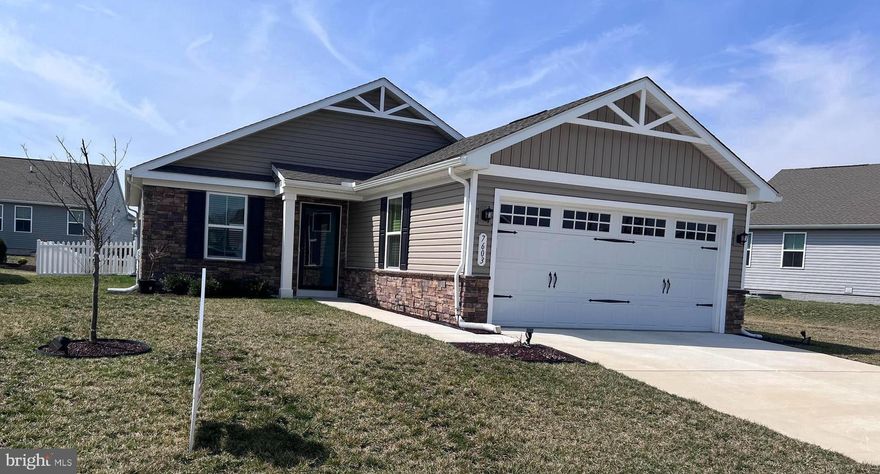 Why wait when this home is Almost New and Move In Ready?   The neutral Palette and well maintained condition make this an easy choice!  The floor plan is open and feels very spacious with floors of durable laminate, carpeted bedrooms and all is smooth for ease in mobility.  The Primary Suite has a walk-in closet, a walk-in shower and tile bathroom floors. The Hall Bathroom features a full size Tub/Shower Combination next to Bedroom 2 with carpet and sizeable closet.  The well equipped Kitchen has a Grand Island,  Granite Countertops, Stainless Steel Appliances, Good Dining Space and a Sliding Door to the Patio, enclosed with a Picket Fence.   There is a convenient Laundry Room right next to Primary Suite with upgraded Washer and Dryer and Tankless Water Heater.  The Garage has nice storage for vehicles and recreation equipment.  Milford Ponds is very walkable and only a short drive to All of Milford! Walk, Run or Bike into town as well!   Within 30 minutes are Dover and The Beaches!!!!   Location, Location, Location!!! Here it is!  Call today!