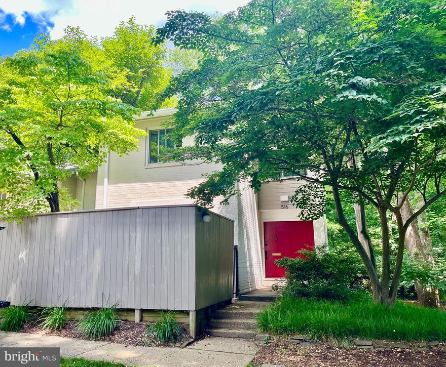 Welcome to 516 New Mark Esplanade and the vibrant New Mark Commons lifestyle. This Mid-Century modern, end-unit townhouse is tucked into a semi-private enclave with lush landscaping, backing to trees and a tranquil walking trail. The main level features a charming fenced patio at the entrance, welcoming entrance foyer, a spacious eat-in kitchen, hardwood flooring, living room and dining room with wood-burning fireplace. Enjoy your privacy and the serene view of trees from the spacious deck on the same level. The upper level features a primary bedroom suite with full bath and wall of closets. Two additional bedrooms and full bath. Light filled with large windows throughout. The lower level offers a spacious recreation room with a walkout to the patio, a full bath, a storage room, and a large utility/laundry room.
Experience a morning stroll along the lake, or indulge in the many New Mark Commons community amenities including the swimming pool, clubhouse, basketball court, tennis courts, walking paths, bike path, playground and community events. This home includes one assigned parking space (D-35) and plenty of unassigned parking spaces. Enjoy the convenience of being approximately 1 mile from the Rockville Metro Station and the Rockville Town Center events, restaurants, and shops. With easy access to 270, 495, and the Intercounty Connector (ICC) route, this home offers the perfect blend of peaceful surroundings and urban accessibility.
Photos Friday.