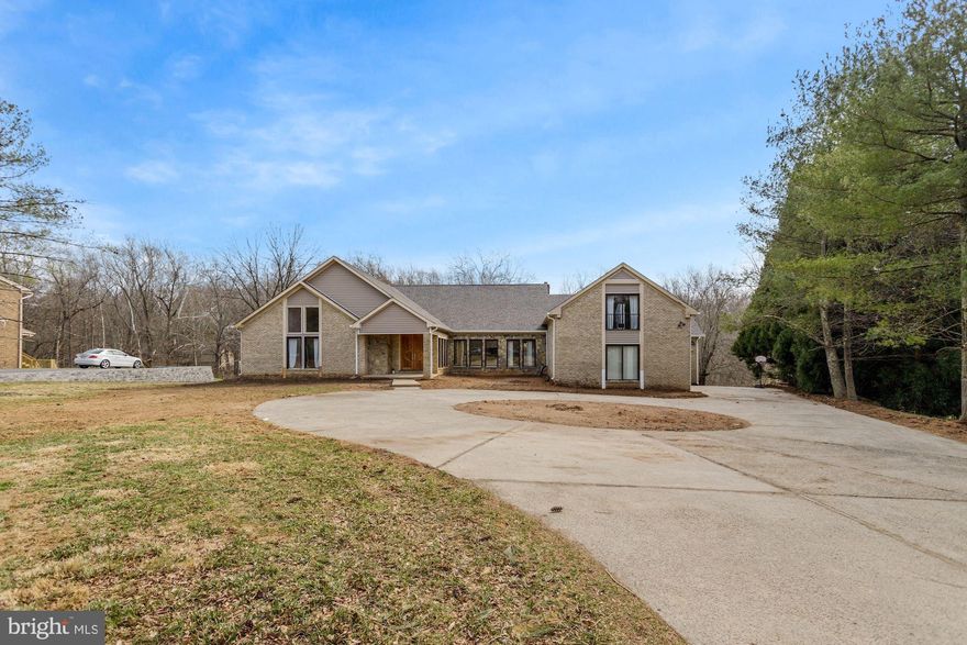 This is a rare opportunity to purchase a highly unique and impressive estate with 20+foot vaulted ceilings and open floor plan .  The house needs work, and the person choosing to do so will have a truly sensational one-of-a-kind home worthy of HGTV.  Situated with over two acres on a cul-de-sac in the prestigious Tara community, this property backs to a small creek and gorgeous woods.   With over 11,000 sq/ft of house including an indoor pool, main level owners suite with vaulted ceilings, and walk out basement, you will love living here in this quiet community.    Minutes to Potomac Village shopping and restaurants, close to I495, I270, and DC- you can enjoy solitude while still benefiting from proximity to conveniences.  This property is being sold As-Is.