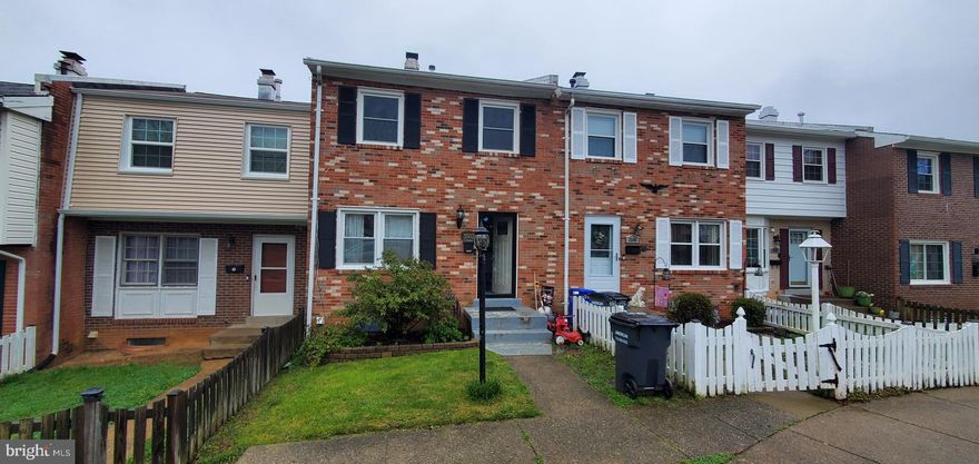 Three levels, beautiful treks deck off 2nd floor. Walkout basement to fenced yard. storage shed in back yard.  Large family room  and an office/playroom.  Full bath in lower level. Updated bathrooms on 3rd level. Beautiful.  large wood floors in Master bedroom, Newer windows. 2 large bedrooms upstairs. Backs to woods On a cul de sac. Very convenient for commuting. Hardwood under all carpet on top 2 floors. Main level large family roome, just remodeled and upgraded half bath, open kitchen with natural light, large window with view of backyard and woods! Dinning area that opens to deck. Come make this house your home!