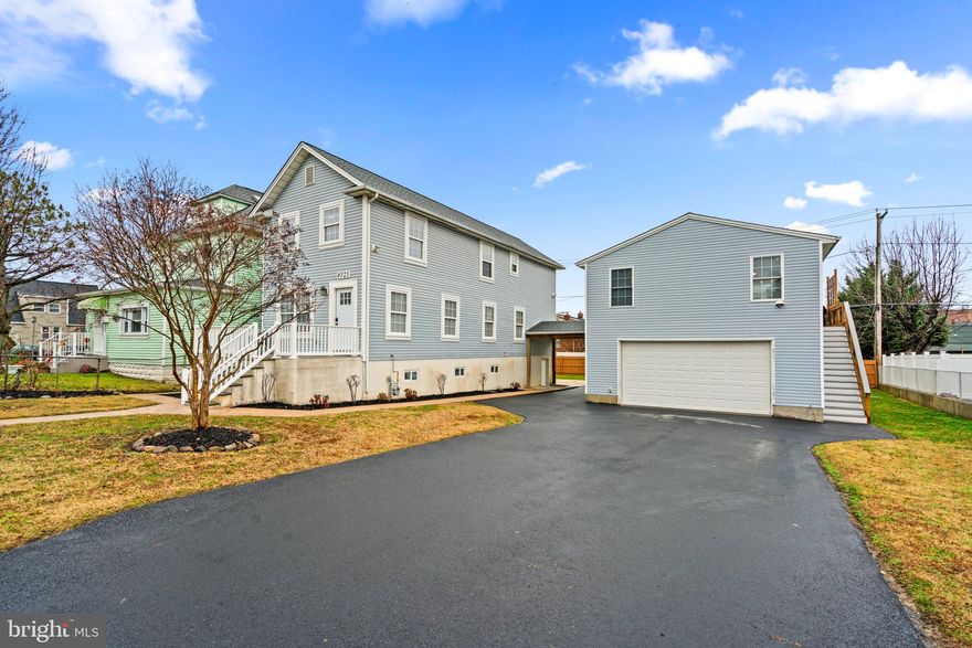 Offer deadline set for Sunday January 7th @ 4pm. Welcome to 6723 Railway Ave!! This unique property consists of a single family house with 4 bedrooms and 2 full bathroom that sits right next to a large garage with another space above with 2 more bedrooms, another full bath and full kitchen. Having both the main house and the lofted space above the garage provides a blend of shared living spaces and private accommodations, offering flexibility for different living arrangements. It's a great way to maximize the utility of the property. A true opportunity to live in one space and rent the other space out for additional income. This setup offers versatility, as the loft above the garage can serve various purposes. It could be used as a rental space to generate additional income or as an in-law suite, providing a separate and private living space for guests or family members. The inclusion of a full kitchen in the loft makes it a self-contained unit.
The main house has an extra large living room space with beautiful hardwood floors, updated kitchen, full bath on the entry level and two zoned HVAC. The upstairs has 4 spacious bathrooms and another full bathroom. The bottom floor currently serves as a basement space with tall ceiling and endless storage. This space could be easily finished for even more livable space. 
Connected to the main house via a roofed walkway is the massive 25' x 25' two story garage space. This is a true two car garage that currently serves as a workshop. The space above the garage is the gem of the property. You will find an updated kitchen, additional living room, full bathroom, 2 more bedrooms, separate washer/dryer, separate HVAC & HWH and a beautiful deck off the back. It is a complete self-contained space that is a sight to be seen. The possibilities are endless with this setup. All of this is situated on a large flat lot, brand new roof & driveway and so much more. 
All in all there are 6 bedrooms, 3 full bathrooms, 2 fully functional kitchens, 2 laundry areas and plenty of storage. 
Come check this one of your yourself. It is a special property.