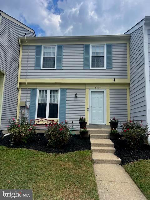 Welcome to this beautifully maintained and spacious 3 bedroom; 2 full bath townhome in one of Burtonsville’s highly sought after communities which is conveniently located to all local commuter routes. Move in ready and ideally located in a quiet neighborhood; this home is move in ready and beautifully landscaped! Step inside to a sun filled main level featuring gleaming hardwood flooring in the living room and dining room. Directly off the dining room enter the outdoor deck from a sliding glass door which provides easily accessible indoor/outdoor living year round. Next the kitchen features new cabinets and grain butcher block countertops that combine for elegance and durability. The bathrooms are also upgraded offering a cohesive and upscale feel throughout the home. Upstairs and going downstairs you will notice brand new carpet on the two stairwells. On the upper level are three bedrooms (with beautiful laminate flooring) including a large master bedroom with an attached full upper level bathroom. Lots of closet space too! The lower level features a large room with new laminate flooring and full bath and a laundry room that is bright with a window. The main room on the lower level provides a brand new sliding glass door featuring built in retractable shades which opens to a fully fenced backyard ideal for outdoor enjoyment, pets or simply relaxing with nature as your backdrop. With easy access to shopping, dining and commuter routes this move in ready townhome offers exceptional value in the quiet Burtonsville location. Don’t miss your chance to own this lovely townhome! Make your showing appointment today!