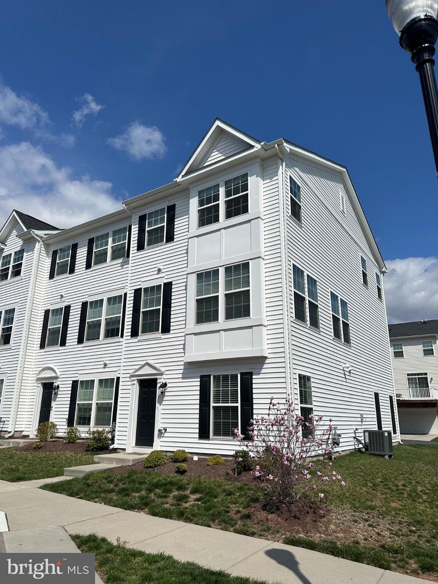 Welcome to 439 Pemberton Park Lane in Frederick's West Park Village. This end-unit townhome features lots of space--over 2,000 square feet of living area across 3 floors! The entry level has a rec room/office with an adjacent 1/2 bathroom, as well as an attached 2-car garage in the rear. Go up a level and you'll find 9' ceilings and a massive fully-equipped kitchen with 42" cabinets, granite countertops, and expansive island with plenty of seating. Dining area with table space too! Very spacious living room that's nice and bright with windows on the front and side, plus an adjacent powder room too! The top floor consists of the primary suite with a walk-in closet, as well as additional closet space, a large bathroom with double vanity and tub/shower combo. Two additional bedrooms, plus a laundry closet in between the bedrooms! Very affordable HOA, plus close to shopping, and major routes! Schedule your showing today!