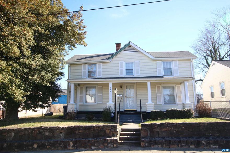 Charming two-story home boasting 4 bedrooms, 2 full baths, and a delightful front porch. Ideally situated in a convenient city location, just moments away from downtown, UVA Hospital, and the bustling 5th St. Station shopping area. This property is offered in AS-IS condition. Embrace the potential of this residence and envision the possibilities.