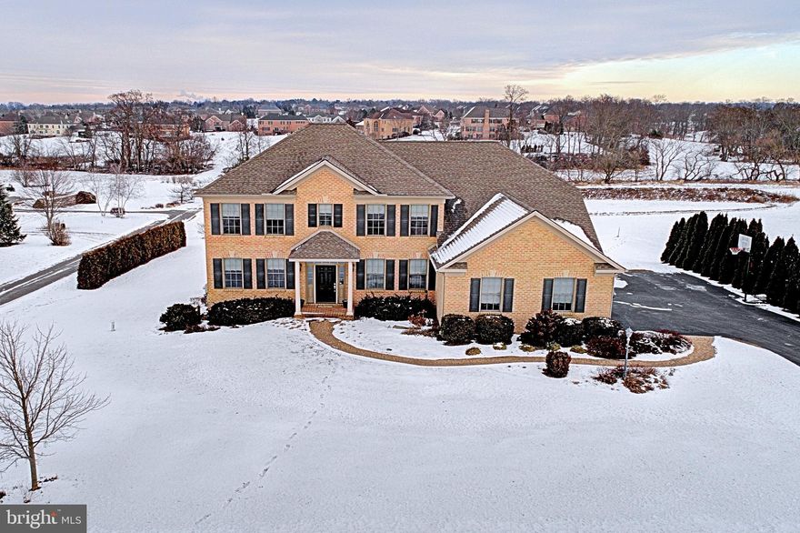 Fabulous custom built Jeff Henry home in open space development of New Brittany. Gleaming hardwood floors. First floor office with French doors, formal living and dining rooms, spacious kitchen with center island,stainless steel appliances,pantry,granite countertops,ceramic tile backsplash. Opens to family room with gas fireplace. Sliders in dining area to deck. The second floor boasts 4 spacious bedrooms and 3 full baths and a laundry with ceramic tile floor, built-in ironing board and utility sink. The master suite has a beautiful tray ceiling, large walk-in closet and luxurious bath with double vanities, dressing table, soaking tub, separate shower. Home backs up to open space.  Great home in a great location.  Move in ready!!