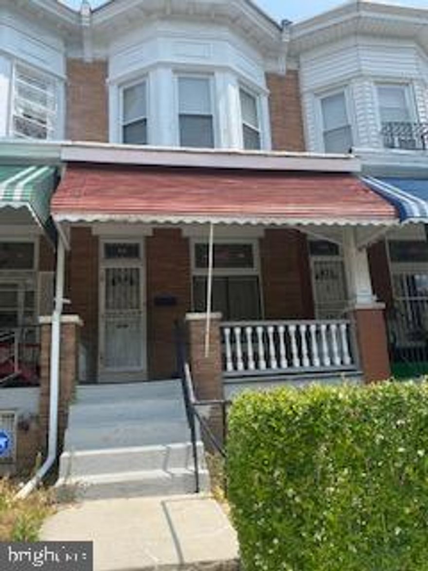 Price Adjustment! Great investment opportunity or for a 1st time home buyer with a little TLC. Rowhome boasts hardwood floors, large rooms, a washer and dryer hookup, a rear deck, a kitchen pantry, fenced rear yard. Sold As-Is.