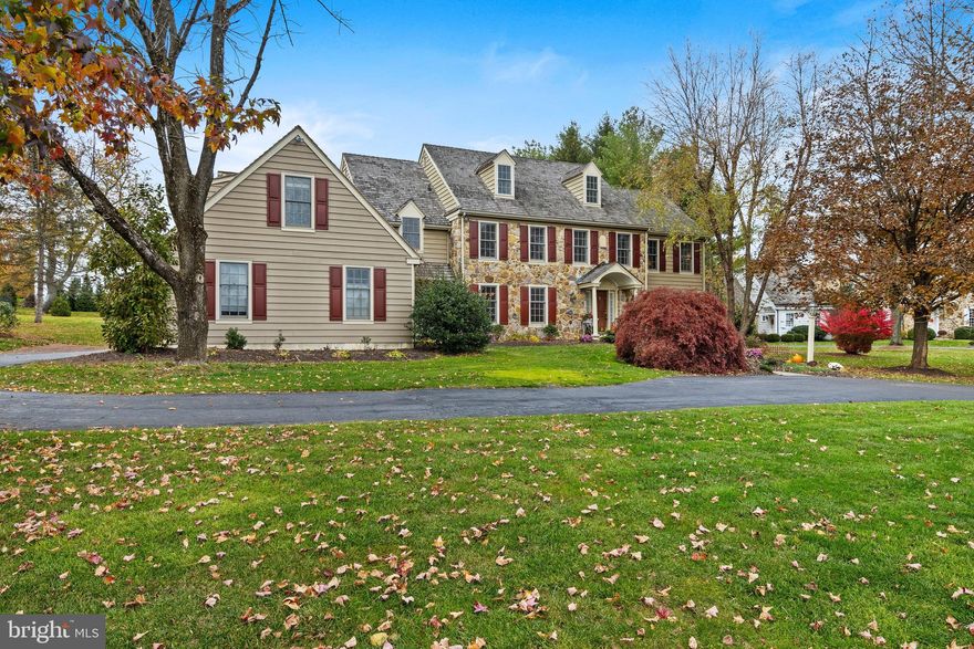 Located on prestigious Meadow Lane in Berwyn in top ranked Tredyffrin Easttown School District, this beautiful colonial home sits on a gorgeous 1 acre lot on a beautiful cul de sac street surrounded by equally beautiful homes. Meadow Lane is a highly desirable neighborhood of beautiful homes with 2 cul de sac streets and no thru traffic making it very private, yet it has easy and quick access to trains, great restaurants and shopping. This special home has a gorgeous new high-end custom kitchen, a nice, fully finished basement with half bath, a private in-law/au pair suite on 2nd floor, another bedroom suite on the 3rd floor – with a total of 4200 sq ft on the top 3 floors. The exterior of the home is stone and cedar siding with a 10-12 yr old cedar shake roof – NO STUCCO!  Special features are a Whole House Generator,  lawn sprinkler system, gleaming hardwood floors throughout most of home, numerous large windows throughout that produce great natural light,  central vacuum system, projection TV and screen, oversized 2 car garage and 2 lovely patios in back.  The spacious and open rear yard can accommodate a pool. This home has a great open floor plan with great flow – perfect for entertaining and family fun!  As you enter the entry foyer, the living room with gas fireplace and door to  patio is on your right and the spacious formal dining room is on your left. The gorgeous, newly renovated custom  kitchen by Peterson's in Bryn Mawr has white cabinets, a huge island that seats 4, high end granite tops, grey subway tile backsplash and high-end appliances including Wolf gas range, GE Monogram 2nd oven, micro and warming drawer, 2 GE Monogram refrigerator drawers, and a GE Monogram refrig. The kitchen and large breakfast area are open to the beautiful sunlit family room with lovely stone fireplace, 2 skylights and a wall of windows in back to take in the views of the gorgeous property. The main floor also has a private office, powder room and spacious laundry/mudroom with private back staircase. On the 2nd floor there are 5 BR’s and 3 full baths, including the generously sized Master BR suite with 2 walk-in closets and high ceiling; and a separately zoned au-pair/in-law suite with 2 rooms, new carpet, full bath, wet bar/kitchenette and access by private staircase. There are 3 add’l nicely sized bedrooms that share a hall bath on this floor.  The 3rd floor has another bedroom suite with private bath and a large bedroom area which is also separately zoned. The lower level rec room/play room is nicely finished with a half bath.  If you are looking for a great house in a great neighborhood with great schools in a fantastic location – this house is for you!
