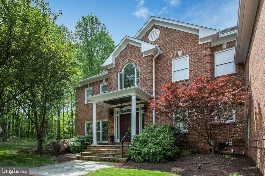 Stunning light filled all brick colonial with circular drive on 2.3 tranquil acres privately located on cul de sac. Designer updates throughout including gourmet kitchen, bathrooms and hardwood floors. High ceilings, 6 bedrooms and 5.5 baths, including au pair suite, large screened porch and spectacular walkout lower level w/ wine cellar & bar. Minutes to Great Falls, Seneca and River Bend Parks