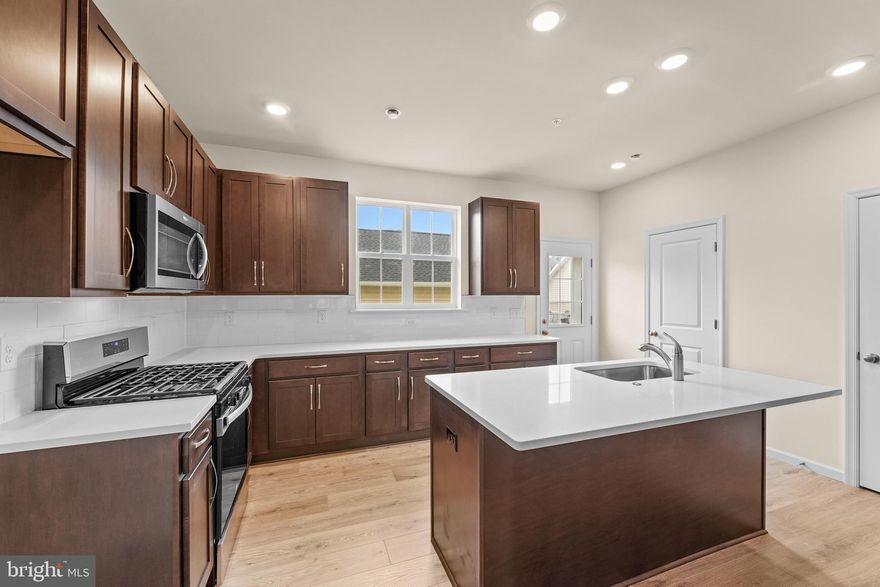 Enter the charming Victoria II townhome and be welcomed by a bright and airy living space.  This well-designed home flows seamlessly from room to room, meaning you will never miss a moment with family and friends!  Prepare a meal on the large kitchen island to serve in the adjoining dining room or enjoy a movie night in the spacious family room.  An optional deck is available and conveniently located off the kitchen, which allows your get-togethers to transition outdoors with ease or enjoy a special space for your morning coffee.  The open first floor also includes sleek stainless steel appliances, gorgeous granite countertops with tile backsplash, beautiful laminate wood flooring throughout including the powder room. Elegant oak-tread stairs guide you to the second floor where you will find the generously sized Owner's Suite with a walk-in closet, two additional bedrooms, a full bathroom and a laundry closet.   Additional highlights to this home include a spacious front porch for outdoor retreat and a detached garage, equipped with a 100-amp subpanel, ready for a car charger!

Please note: Options have been selected by the builder.  Estimated completion is late November/early December.