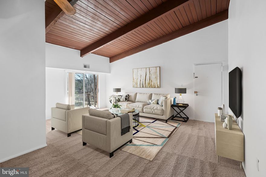 Welcome to this bright top-floor condo, boasting brand-new carpet throughout and striking vaulted ceilings. This expansive residence offers a distinct dining area, recently updated Euro-Style kitchen cabinets. Additional features include extra storage in the attic, a storage bin, an assigned parking space, and ALL utilities included in the low condo fee of $377.

This well-maintained, freshly painted condo is ready for immediate occupancy and is being sold AS-IS—pre-inspections are welcomed. The location is exceptionally convenient, just a ten-minute drive to the University of Maryland. Situated off Route 29 and I-95, it's in proximity to grocery stores, restaurants, shopping, and more.

This delightful condo is the ideal match you've been anticipating. Don't let this opportunity pass you by!