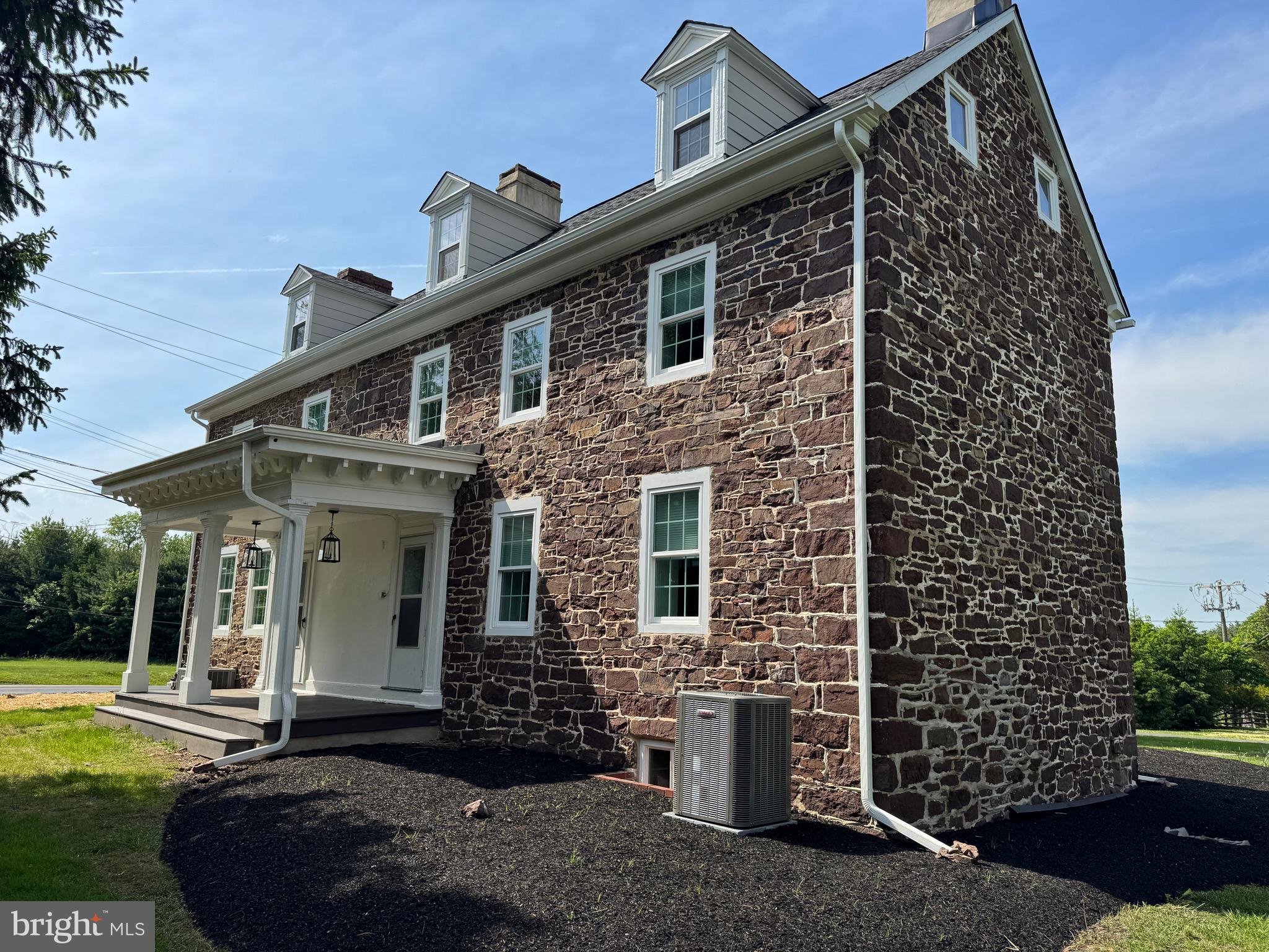Classic Bucks County Stone Farmhouse loaded with charm with huge detached 2 car garage plus a large work area and loft above. New kitchen and bathrooms, new windows; new central air A/C system, new gas heating system, new septic system. Large fenced grounds (area within the fencing - approx. 1 acre - is what is included in the rental - the entire tax parcel is 6.5acres); dining room features walk-in hearth area; large bedrooms and 5th bedroom on 3rd level with huge storage area. The 2 garage spaces on the left are reserved for owners storage. Owners will be installing a privacy fence along 413 and Brownsburg Road.