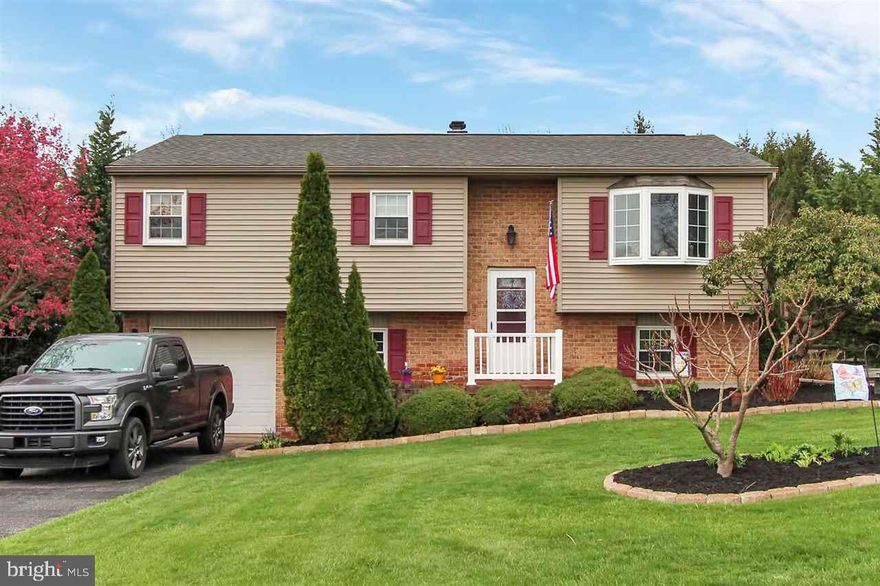 THIS HOME has been lovingly updated! Since 2007, the owners have installed a new: oil furnace, HWH, replacement windows, roof, air conditioning system, hook up for generator, flooring in lower level, kitchen counter tops, half bath, and remodeled the full baths on the main level. Walk-out lower level is finished w/a FR w/wood FP, Office, BR plus Laundry/Half BA. Lovely rear fenced yard with a covered patio & hot tub. Country setting w/nice view!