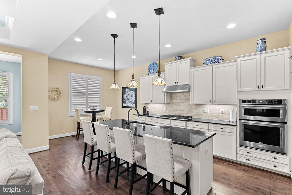 Photo of 42584 Dreamweaver Drive, BRAMBLETON, VA 20148 (MLS # VALO2104172)