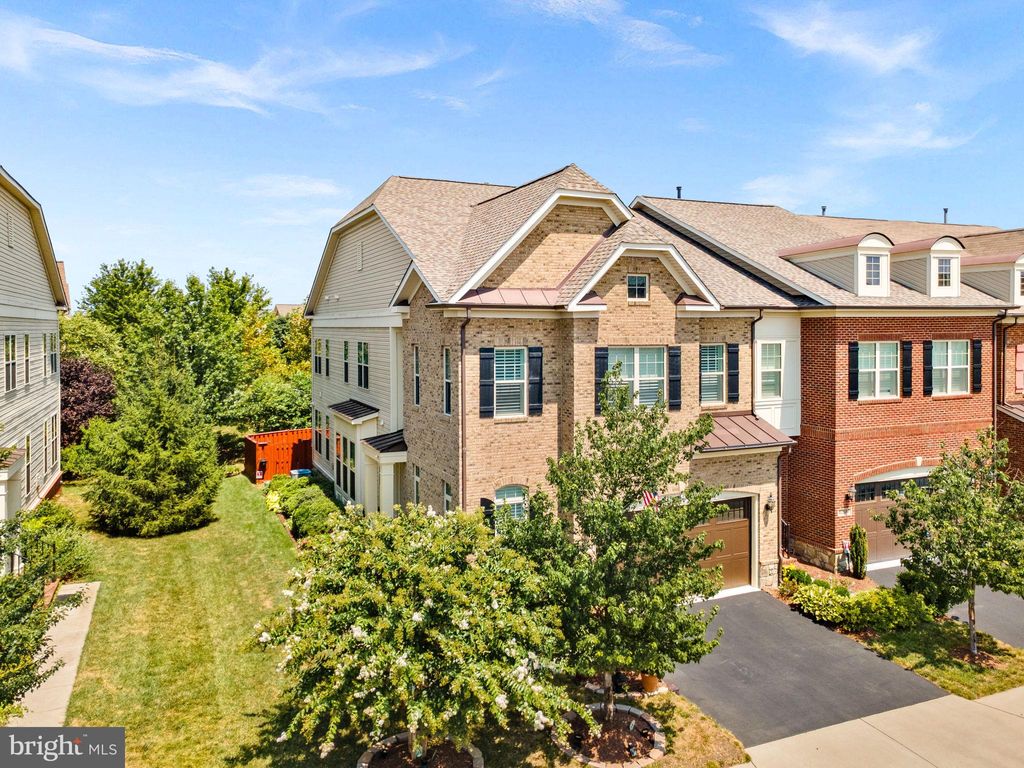Photo of 42584 Dreamweaver Drive, BRAMBLETON, VA 20148 (MLS # VALO2104172)