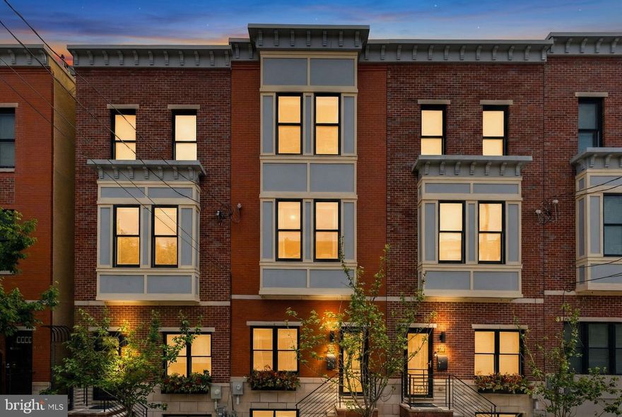 Step into a meticulously curated masterpiece at 805 N LeCount Street, a designer-owned residence that seamlessly blends bespoke luxury with the warmth of a true home. Located in the heart of Fairmount and boasting approximately two years of remaining tax abatement, this stunning 3-bedroom, 2-full, and 2-half-bath sanctuary offers an unparalleled level of detail. The main level is anchored by a chef-caliber kitchen featuring custom cabinetry that soars to the ceiling, a striking waterfall quartz island, a classic white farmhouse sink, and thoughtful functional elements like under-cabinet lighting and hidden plug molds. High ceilings and custom Roman shades throughout create an airy, sophisticated atmosphere that reflects the professional touch of its owner.

The first floor is designed for both style and utility, featuring an artistic powder room adorned with bold, brushstroke-patterned designer wallpaper and high-end lighting. Toward the rear, discover a masterfully designed back exit featuring custom black shiplap detailing and integrated coat hangers, the perfect "mudroom" transition that leads directly out to your very own private, gated parking space.

The design journey continues on the upper levels, where every room tells a story.  From the nursery’s whimsical tiger-print wallpaper to the guest bedroom's custom wood accent wall, the home is a gallery of professional design choices, including high-end chandeliers and integrated custom closet systems. The secondary bedrooms are spacious, and the second-floor guest bathroom is a gorgeous retreat with tasteful tilework and marble-topped vanities. A dedicated, organized laundry closet with custom wooden shelving adds to the home's effortless functionality. The entire third level serves as your private primary suite retreat, featuring a large, custom walk-in closet with stylish black barn doors and a spa-like bathroom complete with a dual vanity, a large glass-enclosed herringbone-tiled shower, and a deep soaking tub set against designer starburst floor tile.

The lower level serves as the ultimate entertainment hub, featuring a fully finished basement equipped with a vibrant, custom-built blue bar—complete with a dedicated wine fridge and intricate open shelving. For the ultimate city experience, head up to the expansive rooftop deck to soak in panoramic Philadelphia skyline views.

Beyond the front door, you are perfectly positioned to enjoy the very best of Fairmount. Start your mornings with a hand-crafted latte from local favorites like Musette or Brown Street Coffee, and spend your evenings at neighborhood staples such as Pier Bar or Hilltown Tavern. With the Philadelphia Museum of Art, Fairmount Park, and the Schuylkill River Trail just a short stroll away, this home offers a lifestyle of unparalleled convenience and culture. Schedule your private showing to experience this designer-curated gem for yourself!