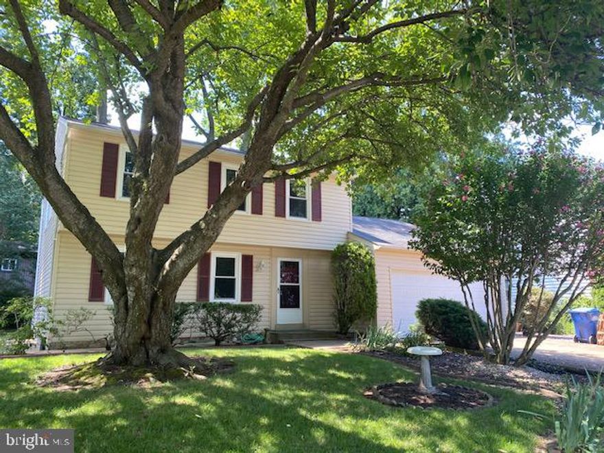 Unique opportunity for detached colonial with garage inside the beltway, at this price! Windows have been replaced for energy efficiency. 3 spacious bedrooms and 2 full baths upstairs. #1 Bedroom has walkin closet. BRs 2 and 3 both good size. Main level entry foyer, separate living and dining rooms, family room with brick fireplace and custom draperies. Kitchen and entry foyer feature natural oak laminate flooring. Large garage. Unfinished basement. Rear yard landscaped, terraced, with separate storage shed.