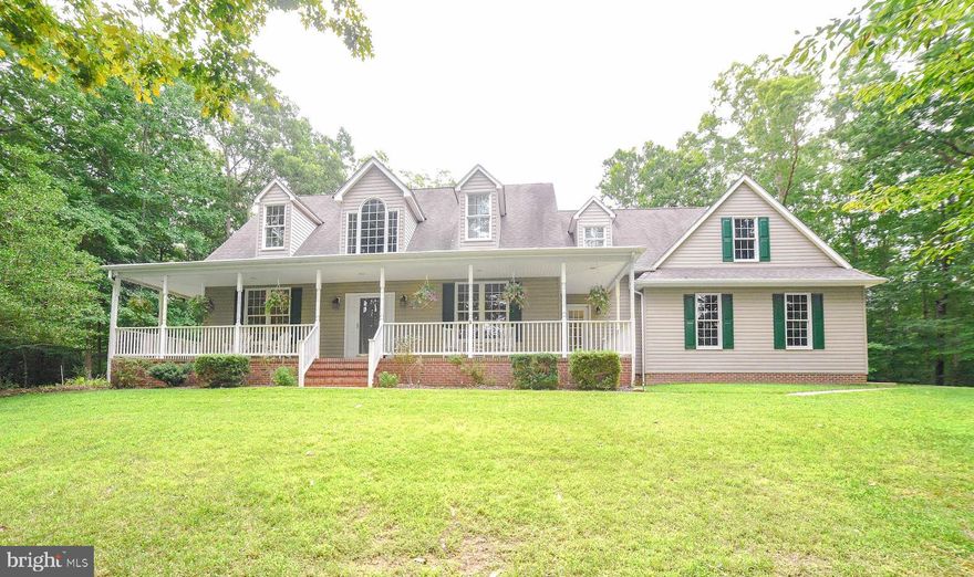 Beautiful  4 bedroom  3 full bath colonial in Hollywood.   Full unfinished walk out basement with plumbing for a bathroom  to do what u like.  9 ft ceilings  first floor, hardwood floors, brand new stainless steel appliances, granite kitchen counters and cherrywood kitchen cabinets.  Wrap around front porch with a treck deck.  Unfinished room over the garage with electric and plumbed for HVAC.  Vermont Casting woodstove in the Family room.   All of this on 16.3 Acres.