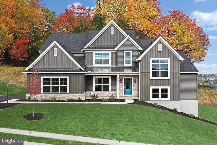 Designer details abound in this 2-story home featuring a 2-car, side-load garage with mudroom entry and laundry room access. A dramatic 2-story ceiling creates a grand first impression in the foyer, where elegant vinyl plank flooring extends throughout the main living areas. Just beyond the foyer and formal dining room, the 2-story great room is warmed by a gas fireplace with stone surround and opens to the kitchen and breakfast area. The kitchen is well appointed with enhanced appliances and cabinets, quartz countertops with tile backsplash, and a large center island and pantry. Off the kitchen, the breakfast area provides access to the rear deck and opens to a sunny hearth room. The home also boasts a spacious loft, a finished lower-level bonus room, and a private study with a cathedral ceiling. The first-floor owner’s suite includes a private bathroom with a tile shower, freestanding tub, double bowl vanity and an expansive closet. Three bedrooms and two full baths are located on the second floor.