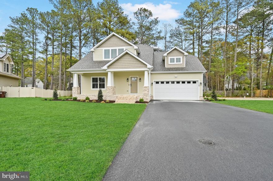 This beautifully crafted 3-bedroom, 2.5-bathroom home in Fruitland, MD offers a perfect blend of modern style and comfort. The open floor plan seamlessly connects the dining room, living room, and kitchen, creating a spacious and inviting atmosphere. The kitchen is a chef’s dream, featuring an island, quartz countertops, Fabuwood cabinets with self-closing drawers, stainless steel appliances, and a stylish tile backsplash. The living room is highlighted by a cozy fireplace, perfect for gatherings. On the first floor, you'll find a convenient half bath for guests. Upstairs, the master suite is a true retreat, complete with cathedral ceilings, a luxurious en-suite with a dual sink vanity, and a walk-in tile shower. Two additional bedrooms and a full bathroom with a tile tub-shower combo round out the upper level. Enjoy the outdoors on your back deck, featuring durable TimberTech decking, ideal for relaxing or entertaining. Additional builder upgrades include CertainTeed siding, IKO Cambridge shingles, MI V3000 series windows, insulated garage door, and a Ring Home Package. The trim package is upgraded to a stylish Craftsman design, and the home features durable LVP flooring with a lifetime warranty, wood shelving in closets and pantry, and tile accents throughout. Well-maintained curb appeal is evident with a black top driveway and landscape bed package. As well as an attached 2-car front facing garage. This home offers a perfect combination of style, functionality, and quality craftsmanship. Don’t miss out—schedule your tour today!