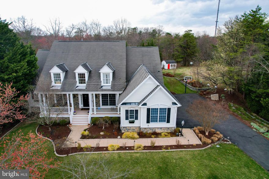 Stunning Luxury Estate in Coveted Burke Neighborhood! 

Perched on a coveted Burke neighborhood of Fairfax Station, this stunning, meticulously renovated 
home blends modern luxury with serene living. No HOA! Absolutely gorgeous custom-built home, beautifully landscaped with a waterfall, koi pond and a wide variety of trees, shrubs, and herbs. 


A grand entry with a huge front porch to enjoy the tranquility of nature and birds. The open floor plan offers expansive space to share the best moments of everyday living with friends and family.

This stunning home offers 5 bedrooms. 4.5 baths, and a spacious, walk-out lower level. A well-lit house with endless windows and doors and warm hardwood floors throughout. Open formal living room with stately columns and a fireplace, for enjoying a quiet time. Large formal dining adjacent to a beautiful study with huge windows and a built-in wall of bookshelves. The spacious family room and breakfast areas are anchored by a cozy fireplace. 

The heart of the home is the stunning kitchen, equipped with sleek Jenn Air appliances and an overhead vent for effortless cooking. The expansive countertops and ample cabinetry provide the perfect canvas for culinary creativity. An abundance of cabinets and a center island is perfect to whip up special snacks to entertain guests. A cozy corner for bar area and a pantry as well. Large French doors lead to the deck, complete with retractable awnings. Plantation shutters add a touch of elegance and sophistication.

 On the main floor is a French-style cherry-blossom powder room, a spacious mudroom, and a chalk-wall with famous quotes to amuse. And then, a spacious, well-lighted owners’ suite, a true retreat with a sitting area and a luxurious spa-like bath. 

All bathrooms are a masterclass in luxury, featuring high-end upgrades designed to pamper and indulge. Upper level has three generously sized bedrooms, each featuring spacious walk-in closets and an abundance of natural light. The guest room has ensuite bathroom and a walk-in closet.

 A fully finished lower level features a private entertainment space that can also be used as a mother-in-law suite, complete with a kitchenette, a spacious bedroom, a luxurious full bath with a walk-in steam shower. Also featured is a large, reclaimed wood-paneled recreation area with a full bar! 

Also find a bonus exercise room and an additional storage space. Sliding doors offer access to the beautiful extra-large stone patio and a private, wooded backyard.

  Don't miss your chance to own a piece of paradise!