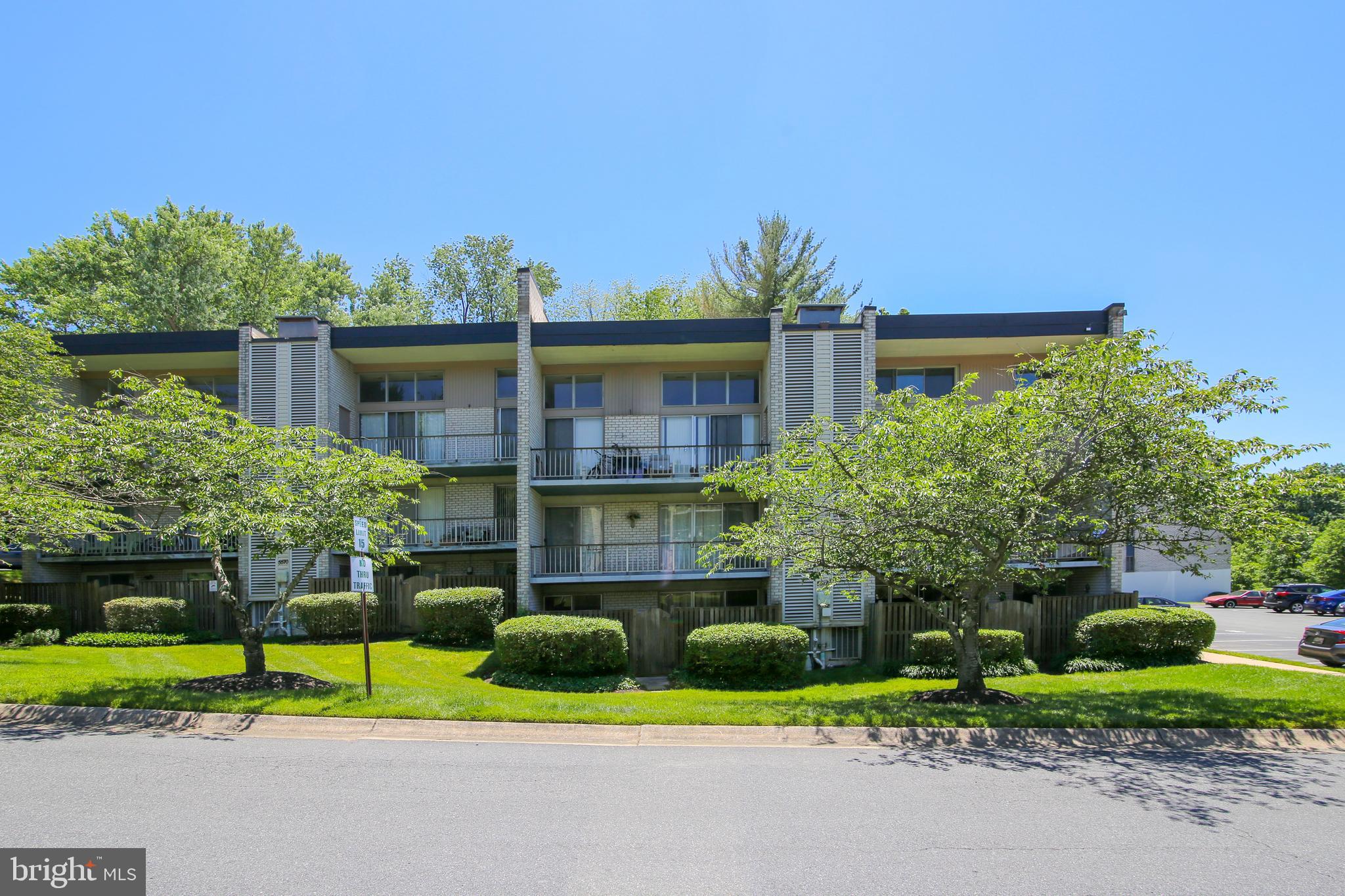 UNIQUE 2BR/1B BURSTING WITH PERSONALITY! This surprising 3-mini-level unit will charm you from the moment you enter! A spacious foyer level welcomes you home with room to settle in. A few steps down leads to cheery living space with access to a large balcony from both living & dining rooms, and an updated kitchen with granite counters, full-height classic Shaker-style cabinetry & pantry. A few steps up leads to two generous bedrooms with great walk-in closets, and a pretty, updated full bath with a storage closet. Unit conveys with 1 assigned parking space. You will love the community! Summer fun is steps away at the pool, and Rock Creek Village Shopping Center, located just around the corner, meets all of your basic shopping needs. For commuters a great location near downtown Rockville & Rte. 200 to I-95.