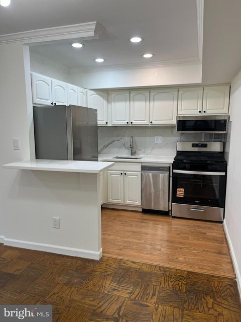 Photo of 7572 Spring Lake Drive #7572-A, BETHESDA, MD 20817 (MLS # MDMC2211592)