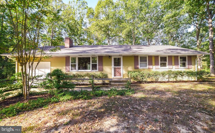 Great rambler on a 1.9 acre corner lot in Leonardtown.  Privacy surrounds this one.  Three generously sized bedrooms and  2 full baths. Kitchen was recently redone with Kraftmaid cabinets, soft close drawers, stainless steel appliances. Family room with fireplace, and one car attached garage.  Two sheds, one used as workshop. Great location!!