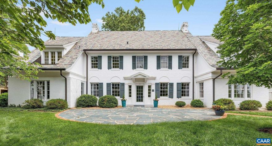 Constructed in 1922 of brick and slate, the noted White Gables Manor Home offers stately architecture and timeless finishes in an incredible location just west of town, with multiple use potential.  The residence's occupant for many years has been a wealth advisory group however conversions back to a single family, 5 bed, 3.5 bath home would be quite simple. Walk to Farmington, Birdwood and Boar's Head.  Host pre-game gatherings in the central location.  Alternatively, this property provides an ideal location for a family office or wealth management company.  2 full bathrooms upstairs and a 3rd could easily be restored, creating a lovely primary suite plus four more bedrooms and 3 full baths.  Or leave as-is and there are a total of 8 offices plus conference room and break-out room. 4 dedicated parking spaces and 2 additional spaces available.  Parcel allows for the creation of 3-4 more dedicated spaces.  Renovations in 2005 included refinished oak floors, new HVAC, all exterior surfaces and systems, mechanical and electrical systems. Exterior just repainted.,Fireplace in Family Room,Fireplace in Living Room