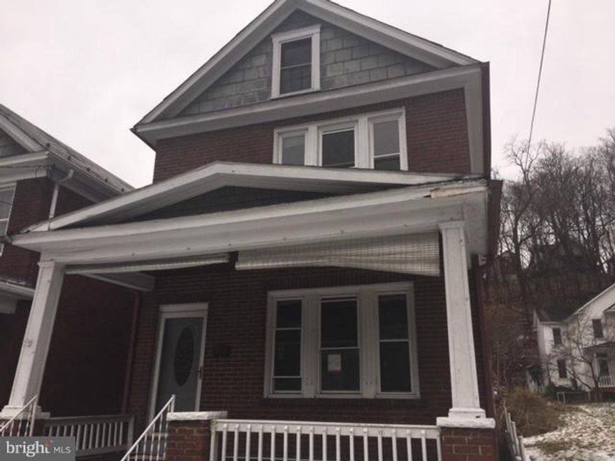 Terrific opportunity to own this solid all brick offering good bones, nice yard, and front porch.  Enjoy wood floors, unfinished attic, and full basement with shower.  A great chance to own your first house or use as a rental property.