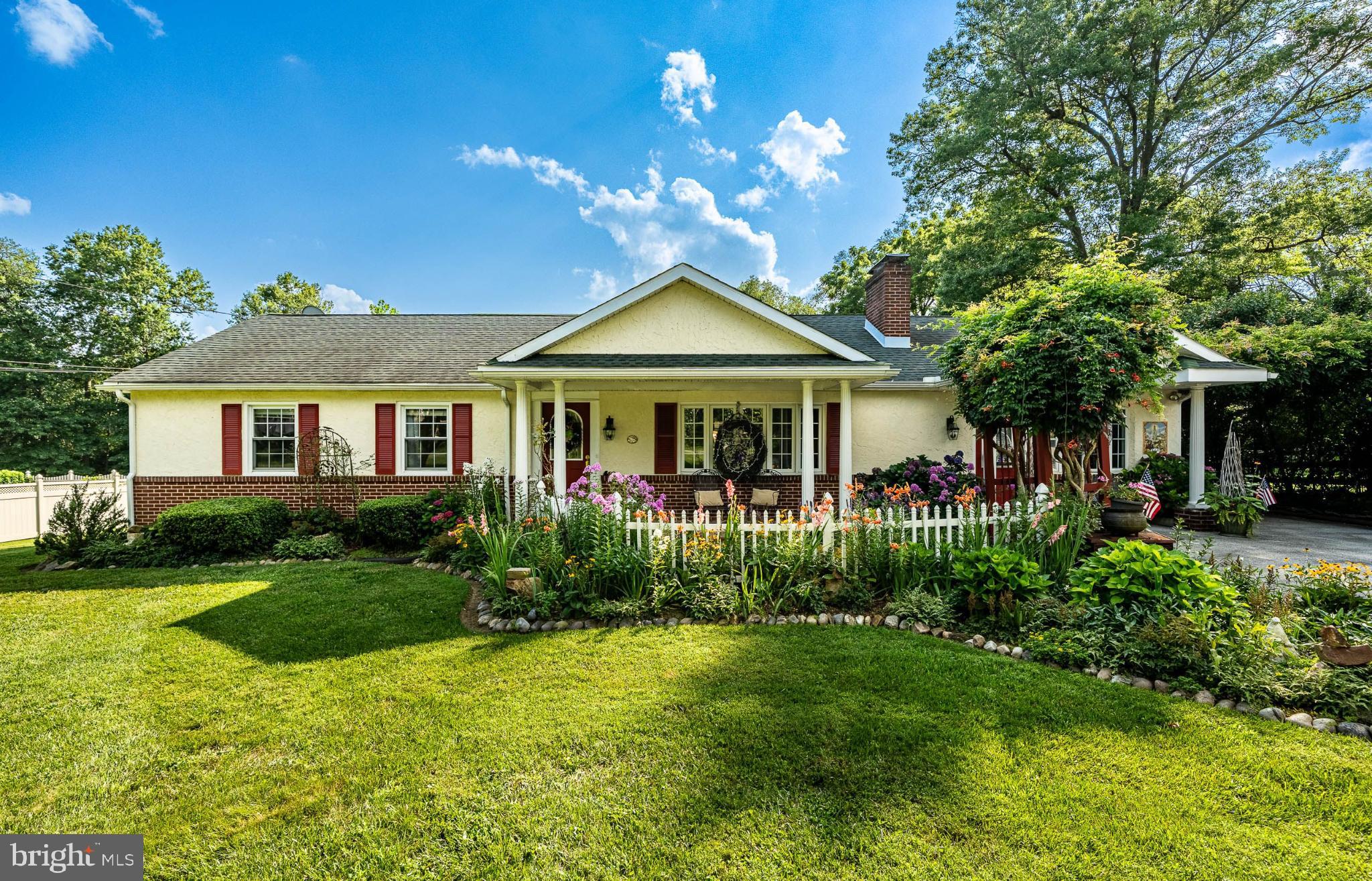 *** Open House Saturday 11-1pm! *** Welcome to 130 Chatwood Avenue – a beautifully maintained custom ranch home tucked away on a quiet street in the desirable West Chester area and just minutes to downtown and shopping!
This property offers peaceful living with resort-style outdoor features and a thoughtfully updated interior.
The heart of the home is the expansive gourmet kitchen, complete with beautiful granite countertops and natural terracotta ceramic tile flooring, cathedral ceiling with skylight and fan, stainless steel appliances, gas stove, and white cabinetry with approximately 38 handles. There's a built-in desk area with shelves and a tile backsplash, and the kitchen opens to a bright large sunroom overlooking the beautiful inground pool, mature fruit trees, a small pond, and professionally landscaped perennial gardens—creating a private backyard oasis. The main level includes three bedrooms, all with hardwood flooring and ceiling fans, plus a full hall bath with a shower/tub combo, updated sink, and newer countertops. The living room features a charming brick fireplace with mantle, as well as crown molding and chair rail that continues into the spacious formal dining room.
The finished lower level offers fantastic bonus space, including a fourth bedroom, a second large full bath with a tiled shower, a large family room, and a bar area with a sink—perfect for entertaining or extended guests. There is a washer and dryer and a kitchenette with sink. There’s also an abundance of storage and closet space throughout.
Additional highlights include a deep one-car garage with extra storage space, newer mechanicals including a 10-year-old roof, 3-year-old HVAC system, and 3-year-old water heater. In the front of the home is a white picket fence, stone walkway, and carefully manicured gardens provide classic curb appeal reminiscent of a Martha’s Vineyard retreat.
This is a rare opportunity to own a custom home with charm, updates, and outdoor beauty—all just minutes from the heart of West Chester.
Call today!