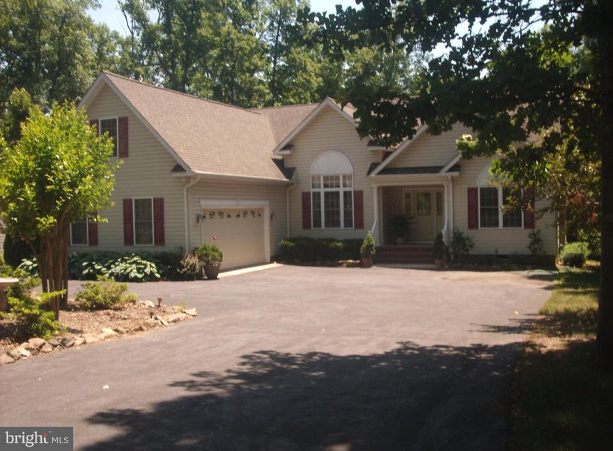 Gorgeous Home, Awesome Landscaped Private Lot, Huge paved circular driveway for the large gatherings! Might be just what your looking for, popular split bedroom floor plan, main living areas hardwood floors, only carpet in Bdrms. Bonus room/4th bedroom over garage for your flex space! 12x15 Screen porch overlooks wonderful deck, patio, Japanese garden(fresh mulch coming-many yard items can convey)