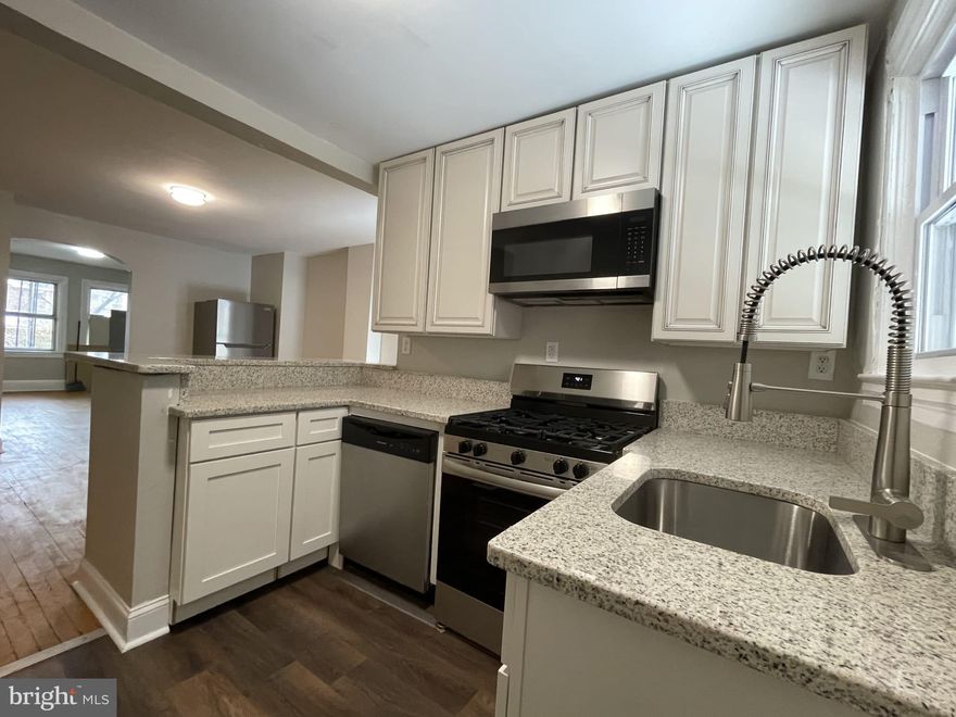 Welcome to this freshly renovated 2-bedroom 1.5-bathroom, reasonably priced home in West Baltimore. The home showcases a brand-new kitchen with granite countertops, brand-new stainless-steel appliances, freshly painted walls throughout the house. The first floor offers hardwood flooring leading to the dining area and the kitchen.  The two bedrooms are located upstairs featuring a brand-new bathroom with skylight.  The partially finished basement provides an additional space that can be used as a third bedroom or for recreation.  The home is move-in-ready condition.  A highly motivated Seller.  All offers will be considered.