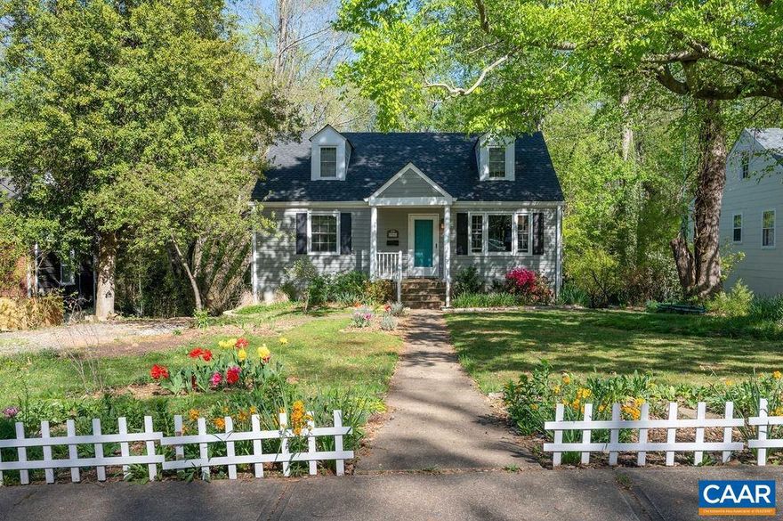 Don't miss this storybook gem of a home in a friendly neighborhood where sidewalks are well used. Get to know your neighbors as they are strolling by. Sunny front yard full of perennials, bulbs, and flowering shrubs. Landscaped back yard with a chicken coop for your pet chicks and fresh eggs. Solid 1950s construction with modern updates and improvements. A rear addition adds a beautiful sunny living area with an attached deck to the layout upstairs and a separate office on the lower level with an exterior entrance. Ting fiber optic internet makes this a perfect work-from-home office. Renovated kitchen with updated appliances including induction stove, renovated bathrooms with tiled floors, and a real primary bedroom suite with attached office area or nursery. Recent upgrades to the roof, plumbing, electric, and HVAC. Lots of storage in the dry basement. Walk to Greenleaf Park or to the Crow Rec Center and Pool, both only � block away. McIntire Park and the YMCA are only minutes away. Walkable to CHS with the addition of the pedestrian bridge over the bypass. Only 1.6 miles to the Downtown Mall, it's an easy bike ride or doable walk. Easy access to the bypass makes this a very convenient location for accessing anywhere in the City.,Granite Counter,Wood Cabinets