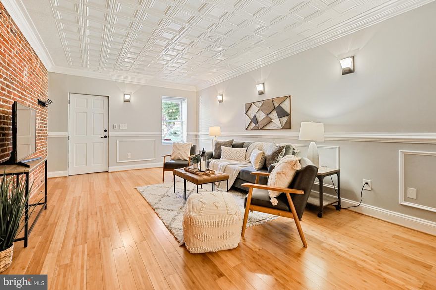 Gorgeous completely renovated 3 bedroom 2.5 Canton home! Living room with chair rail, crown molding, wainscoting, exposed brick and tin ceiling. Gourmet kitchen with dining area, island with seating for four, stainless steel appliances, marble counters and bar area with wine fridge. Exit the kitchen to a paved patio area perfect for grilling. Upper level includes two bedrooms both with en suite baths and laundry. Lower level is finished and can be used as a third bedroom, office or rec. room. Amazing two tiered deck with views of the water and city.