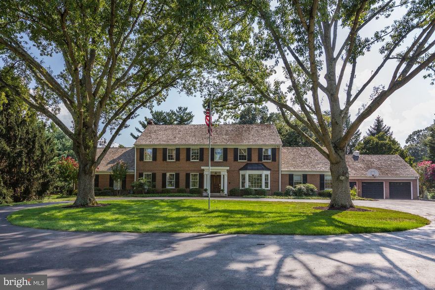 Wow!, what curb appeal. Do not miss this wonderful home sitting on over 2.5 acres with pool and tennis court. Many recent improvements make this home move-in ready. First floor boasts a master bedroom suite with sitting  off the sunroom and a private au pair suite which also includes a sitting room off the mudroom.  All upper level bedrooms are very  generously sized, and includes a second master bedroom. Non mandatory HOA is $750 per year. Includes security of neighborhood by a private company.