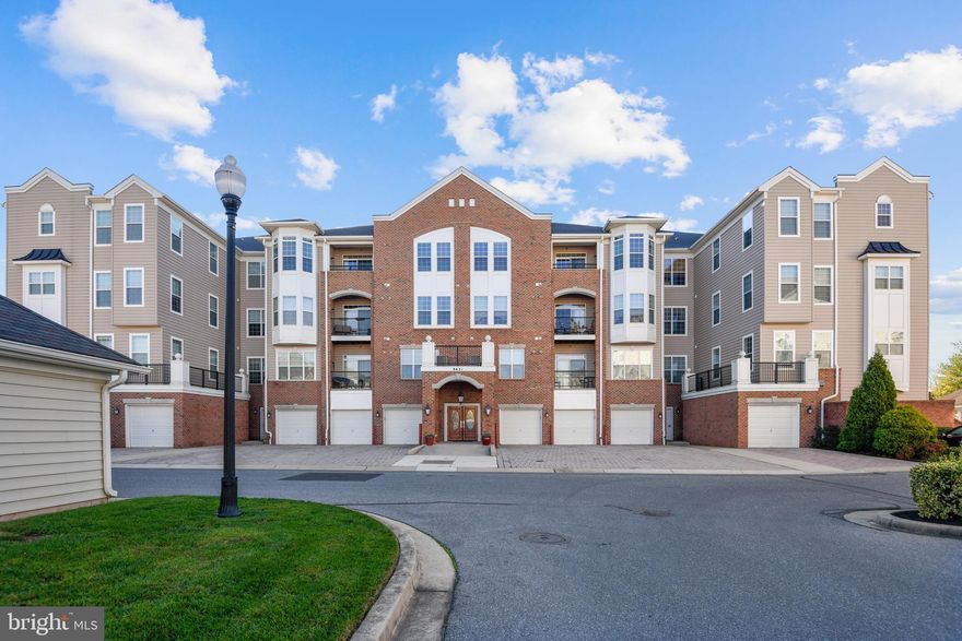 Here's your chance to live in Cedar Ridge at Piney Orchard. This amenity rich Active Adult community has so much to offer.  The moment you walk through the main door, you will feel right at home. Take the elevator up to the 4th floor and enter this very spacious 2 bedroom, 2 full bath  condo with a large bonus room that can be used as a den or an office.  The primary bedroom boasts a beautiful tray ceiling,  spacious closets, with en suite bathroom. The open space living area is adorned with crown molding.  Step out to the large balcony to enjoy morning coffee or afternoon beverage of choice.  There is a one car attached garage with plenty of additional storage.  Come see all that Piney Orchard has to offer.  Conveniently located to shopping areas, major routes to Baltimore, Washington, DC, and Annapolis.