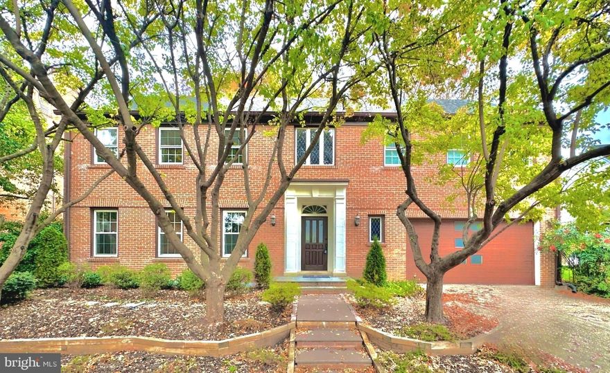 A rare and absolutely stunning house in a prime DC location! 
Renovated from top to bottom in 2019 to look like new - see  LIST OF IMPROVEMENTS and  Floor PLAN in the Documents section of this listing. Multiple sliding glass doors on the main level blend the interior with the charming, gorgeously landscaped garden perfect for relaxation and social gatherings. Upper level has four large bedrooms, each with an en-suite bath. Primary bedroom boasts one-of-a-kind extended dressing room bathing in natural light. Expansive lower level includes a versatile entertainment area, bar, fitness room, a bedroom and a full bath. Brick exterior on all sides, 2-car garage, 2-zone HVAC. Quiet street yet close to everything.