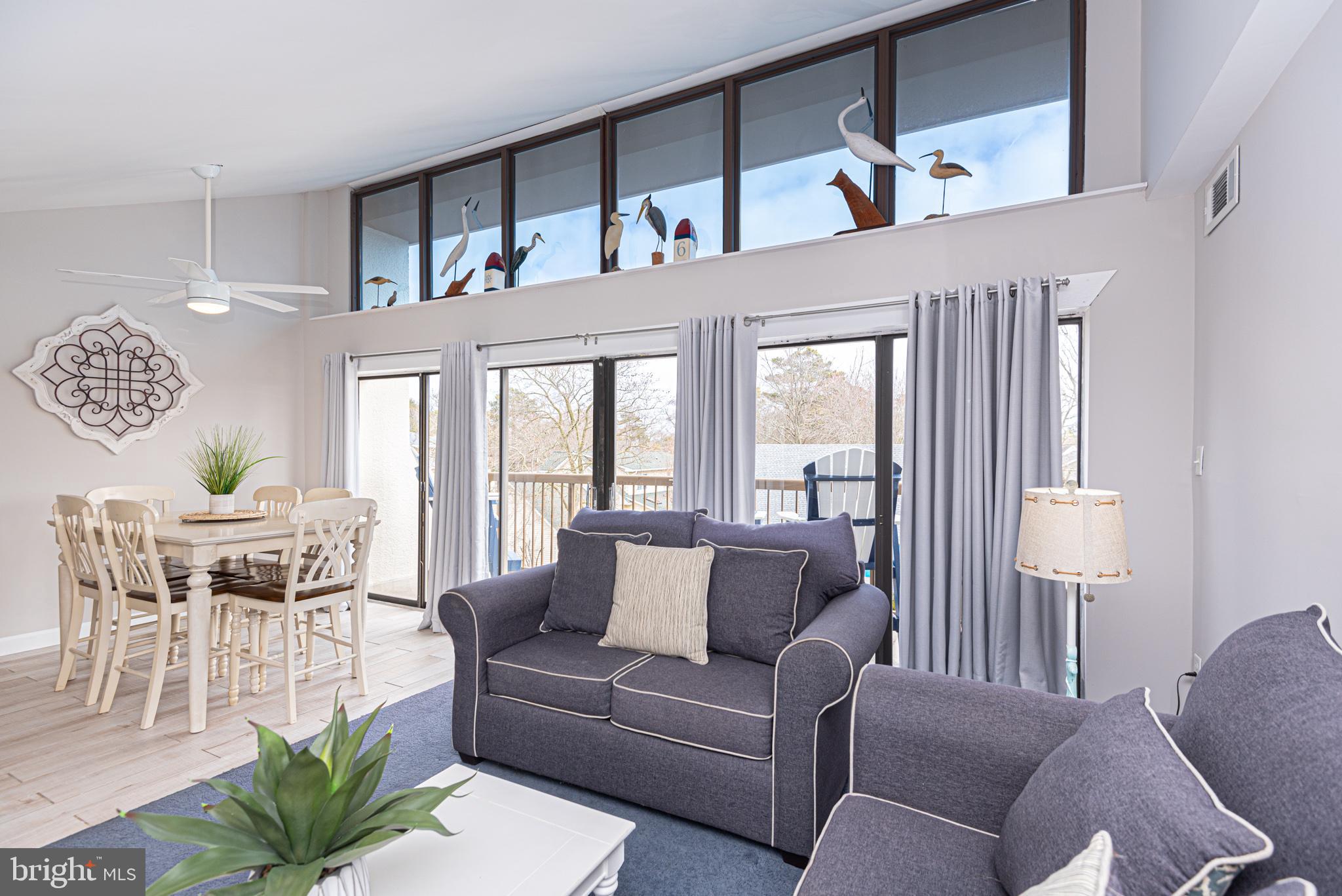 Don't miss your opportunity for fun in the sun! This beautiful 2 bedroom/2 bath smoke-free unit in the Tiburon is located in the sought after Caine Woods neighborhood in North Ocean City. It is a short walk to the beach, restaurants, and shopping. The primary bedroom is generously sized with an ensuite bathroom and closets. The 2nd bedroom is beautifully decorated with closet space. Renovated kitchen complete with new floors, stainless appliances, new cabinets and granite countertops. The bathrooms have been updated too with gorgeous flooring and vanities, updated mirrors, and lighting and also a washer and dryer hookup. The unit has been freshly painted throughout. Take advantage of this top floor unit with vaulted ceilings and natural lighting. Enjoy an afternoon cocktail on your large private balcony or take a dip in the large, community pool. Amenities include cable, outdoor pool, tennis courts, pickle ball courts, washer/dryer room in the building with extra storage, bike racks, grills, lots of outside green space for your enjoyment, off-street parking in the lot adjacent to the unit, plenty of street parking and professional management. You can enjoy this condo for yourself, or it also makes a great investment property. The gross rental income for 2023 was. $23,101.00. There are reservations scheduled for summer 2024 if the buyer wants to honor. This beautifully decorated, turn-key property conveys fully furnished and ready to go for your Summer fun or for year round living!