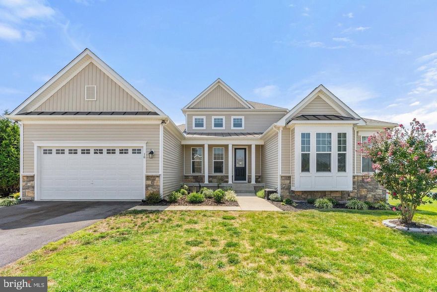 **Stunning Former Model Home – Where Elegance Meets Functionality!**   This home is also for sale! Discover this breathtaking former model home, meticulously designed with a perfect balance of style and practicality. Nestled on a beautifully manicured corner lot, this residence offers 9-foot ceilings and nearly 4,500 square feet of sun-drenched, open living space.   Step inside to find rich hardwood floors, sophisticated wainscoting, and exquisite crown molding. The heart of the home is the gourmet kitchen, featuring an expansive island with a breakfast bar, pristine white cabinets, stainless steel appliances, a double oven, and a built-in microwave. The adjoining living room, highlighted by a stunning stone fireplace, creates a warm and inviting atmosphere.   The main level boasts two spacious bedrooms and two full bathrooms, including a luxurious primary suite. This retreat showcases elegant crown molding, chair rail, wainscoting, a generous walk-in closet, and a spa-like ensuite bathroom with double sinks, granite countertops, a soaking tub, shower stall, and a private water closet.   Upstairs, you'll find a third bedroom, a full bathroom, and a sprawling family room — perfect for relaxation or entertainment. The fully finished lower level is a versatile space, offering a massive recreation room, a fourth bedroom, a fourth full bathroom, and a bonus room that could serve as a fifth bedroom, theater, or home office.   Outdoor living is equally impressive, with a low-maintenance Trex deck that steps down to a beautiful patio and a vast backyard — ideal for gatherings or quiet moments. Yard maintenance is made easy with the lawn irrigation system. The covered front porch adds an inviting touch, and the two-car garage provides ample storage.   Live efficiently and environmentally friendly with green efficient construction, HVAC, lighting, and appliances, as well as moisture control for green indoor air quality and low-flow fixtures & efficient hot water distribution for green water conservation.  This highly sought-after community offers exceptional amenities, including a pool, clubhouse, playground, walking trails, and scenic common areas. With easy access to US-340, WV-9, and VA-7, commuting to Northern Virginia is a breeze. Additionally, enjoy the charm of nearby historic Harpers Ferry and the local wine region just minutes away.   Don't miss your chance to own this remarkable home — where luxury and convenience unite!  Also for sale!