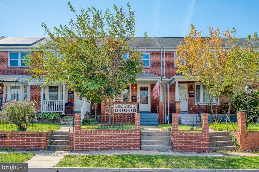 Welcome to this fully renovated 3-bedroom, 2-bathroom Colonial-style brick front townhome in the heart of the Middlesex community in Essex. From the moment you arrive, the decorative brick fencing and spacious covered front porch create a welcoming atmosphere. Step inside to a bright and airy living space, where a combination of natural light and updated modern fixtures beautifully highlights the refinished hardwood floors in the living and dining rooms. The galley-style kitchen, with its sleek ceramic tile and functional island, opens up to the dining area, offering a seamless flow for cooking and entertaining. Upstairs, you'll find three spacious bedrooms, each with brand-new carpeting, vaulted ceilings, and ample closet space. The newly updated full bath features ceramic tile flooring and a tub-shower combo, providing a relaxing retreat. Pull-down attic steps add extra storage convenience. The lower level offers additional living space with a carpeted family/recreation room, a second full bath with a stall shower, and a laundry/utility room with laminate flooring. Walkout stairs lead directly to the rear of the home, where you'll find a fully fenced area that doubles as a low-maintenance outdoor space and a concrete parking pad for one car, with additional on-street parking available. This home is meticulously updated with attention to detail at every turn. Located in the vibrant Middlesex community, you'll enjoy easy access to nearby parks, shopping, and dining. If you’re looking for modern comfort in a well-established neighborhood, this home is a must-see. Schedule your visit today and experience all this property has to offer!