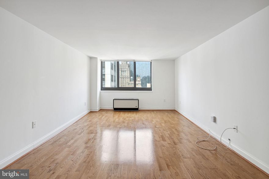 Recently renovated one bedroom on a high floor of  The Academy House featuring see-forever city skyline views. The home has wood floors; modern kitchen with wood cabinetry, stainless steel appliances and granite countertops; and an updated bathroom with stylish tilework and a washer/dryer. There is excellent closet space throughout. 
Residents of Academy House enjoy a 24-hour doorman and a state-of-the-art fitness and aquatic center. There is valet parking in the building's garage for an additional monthly fee, subject to availability. 
The Academy House is located in the heart of Center City and within close walking distance to Rittenhouse Square, Washington Square, and the Broad Street and Market Street office corridors. The Philadelphia International Airport and Amtrak's 30th Street Station are easily accessible.