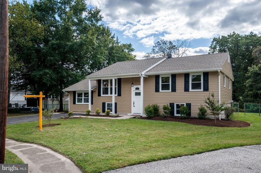 Beautifully updated home with open living areas. 5 beds/2 baths. New kitchen w/ stainless appliances & granite counters, hardwood floors.  New tiled bathrooms!  New Siding & landscaping. HUGE backyard backs to woods.  New deck to entertain plus fenced in yard.  2 storage sheds.  Lower level has 2 bedrooms, 1 bathroom, Rec Room and Storage Room w/ shelves.  Centrally located to shopping & schools.