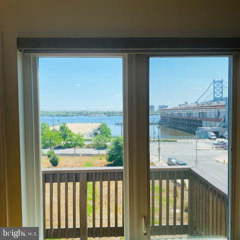 Price Reduced! Water View! Nestled between Old City and Northern Liberties, bright and sunny condo for sale. Overlooking the Delaware River. Home has a spacious open layout with beautiful hardwood floors, a nice-size tiled kitchen with plenty of cabinet space, as well as two sunny bedrooms with a carpeted hallway and walk-in closets. The kitchen features built-in dishwasher and disposal, along with a large refrigerator. This condo's layout gives the sense of privacy with fully carpeted bedrooms on either side of the condo. Generous closet space all throughout this unit, along with a stackable washer and dryer in the unit. Directly under the unit there is one car parking with inside access to the condo, as well as a large separate storage unit. Building features an intercom entry security system, with keyed main entrance as well as keyed entrance to each floor. Gorgeous views of the Delaware River and Ben Franklin Bridge and just a few blocks away from all of the highlights of Old City and Northern Liberties restaurants and shops. Close proximity to public transportation and easy highway access to I95 and the Philadelphia Airport
