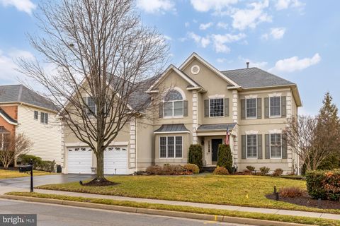 Photo of 43592 Lucketts Bridge Circle, ASHBURN, VA 20148 (MLS # VALO2116790)